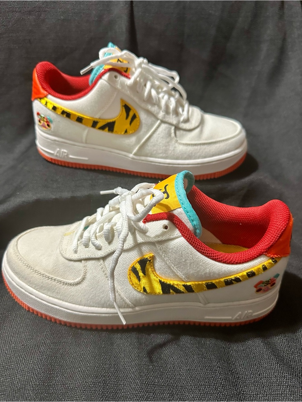 Nike White Sneakers with Yellow Tiger Swoosh and Red Liner